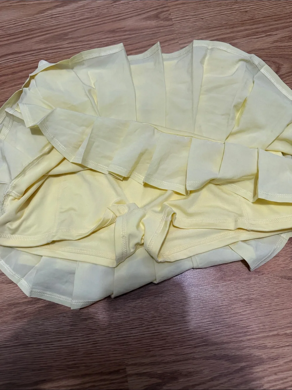 ALO Yoga Pleated Mini Skirt in Pale Yellow